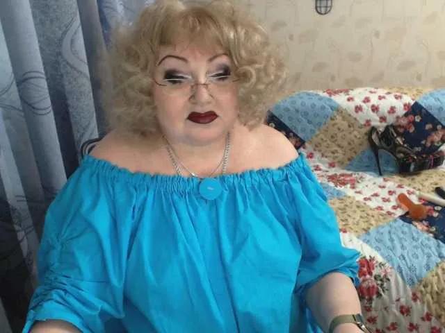 livingnextdoor — really mature woman with curvaceous sexy body...very  blond hair...  sexy nails... big nipples and nature very hairy pussy...hard clit between very very very long pussylips ! looking for young student for give some sex lessons or men who know how make...